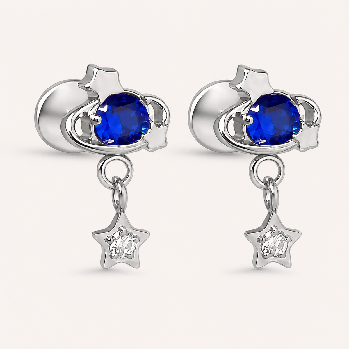 Titan-Ohrringe mit blauem Zirkonia und kleinem Sternanhänger